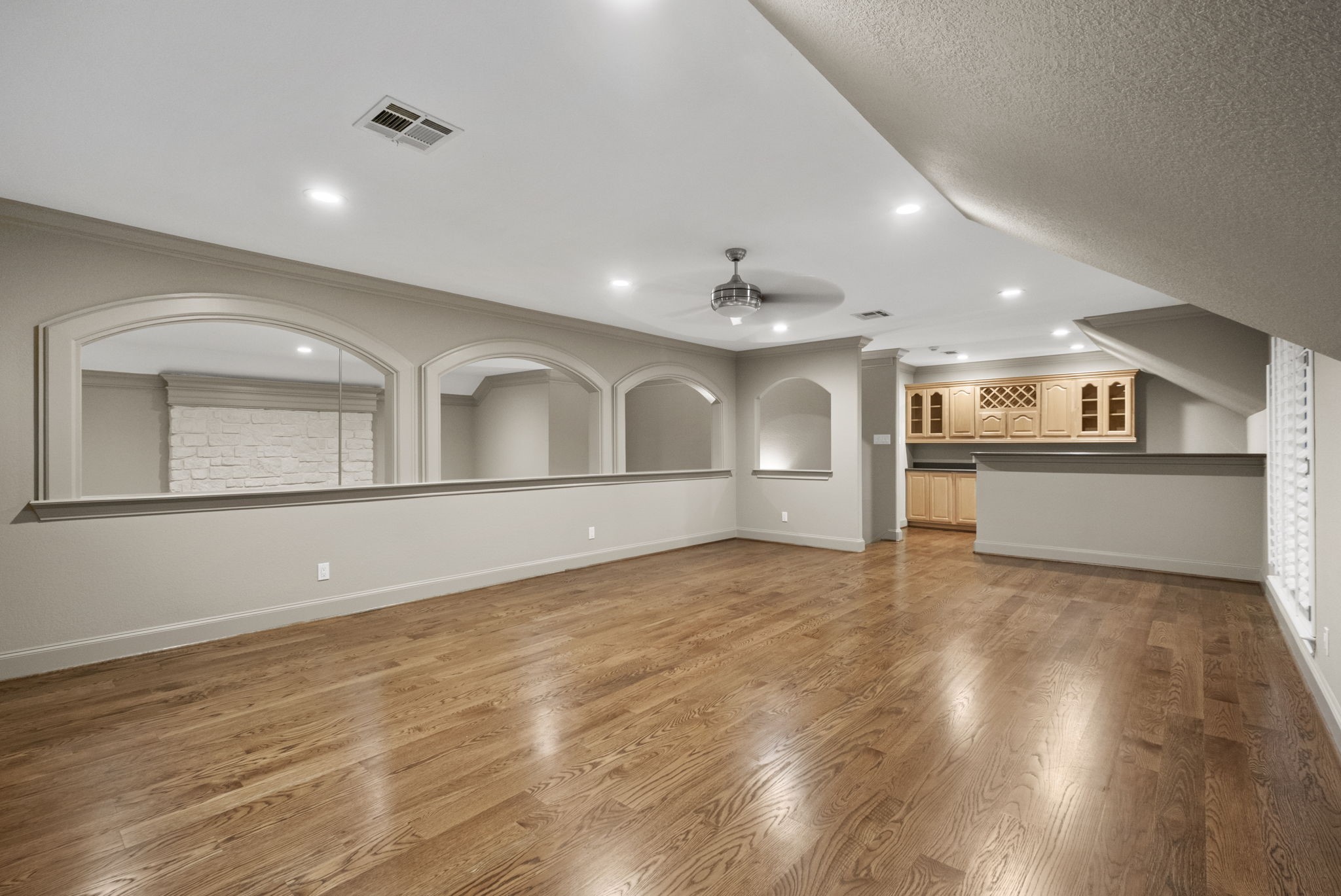 20010 Timber Ridge Drive Magnolia, TX 77355 - Photo 29 of 50 The spacious game room and wet bar provides plenty of room for recreation, lounging, or a home theater setup. Open to the living area below, it creates a bright, connected feel while still maintaining its own private retreat.