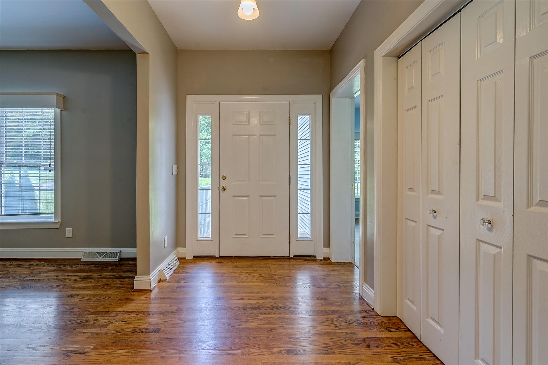 340 Mallard Point Road Wirtz, VA 24184 - Photo 10 of 41 an empty room with wooden floor and windows