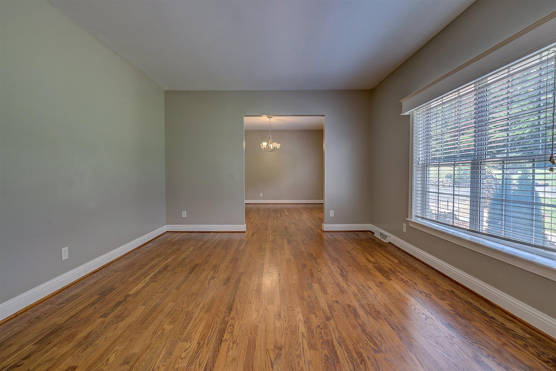 340 Mallard Point Road Wirtz, VA 24184 - Photo 11 of 41 a view of an empty room with wooden floor and a window