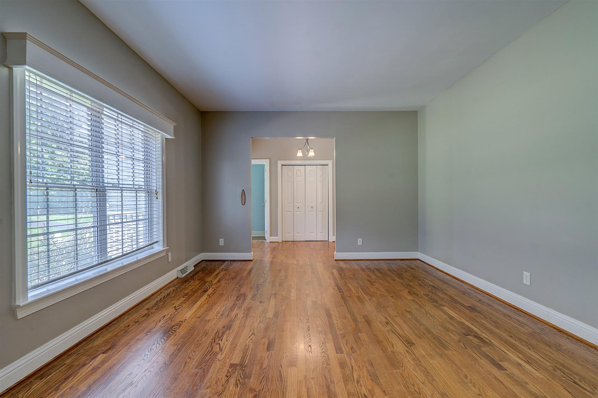340 Mallard Point Road Wirtz, VA 24184 - Photo 13 of 41 a view of an empty room with wooden floor and a window
