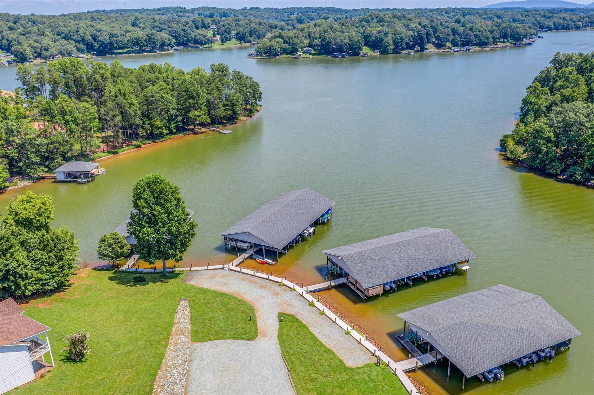 340 Mallard Point Road Wirtz, VA 24184 - Photo 3 of 41 an aerial view of a house with outdoor space and lake view