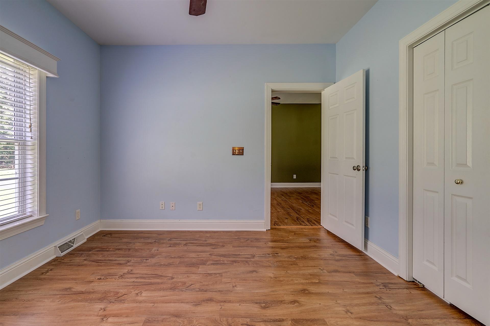 340 Mallard Point Road Wirtz, VA 24184 - Photo 23 of 41 a view of an empty room with wooden floor and a window