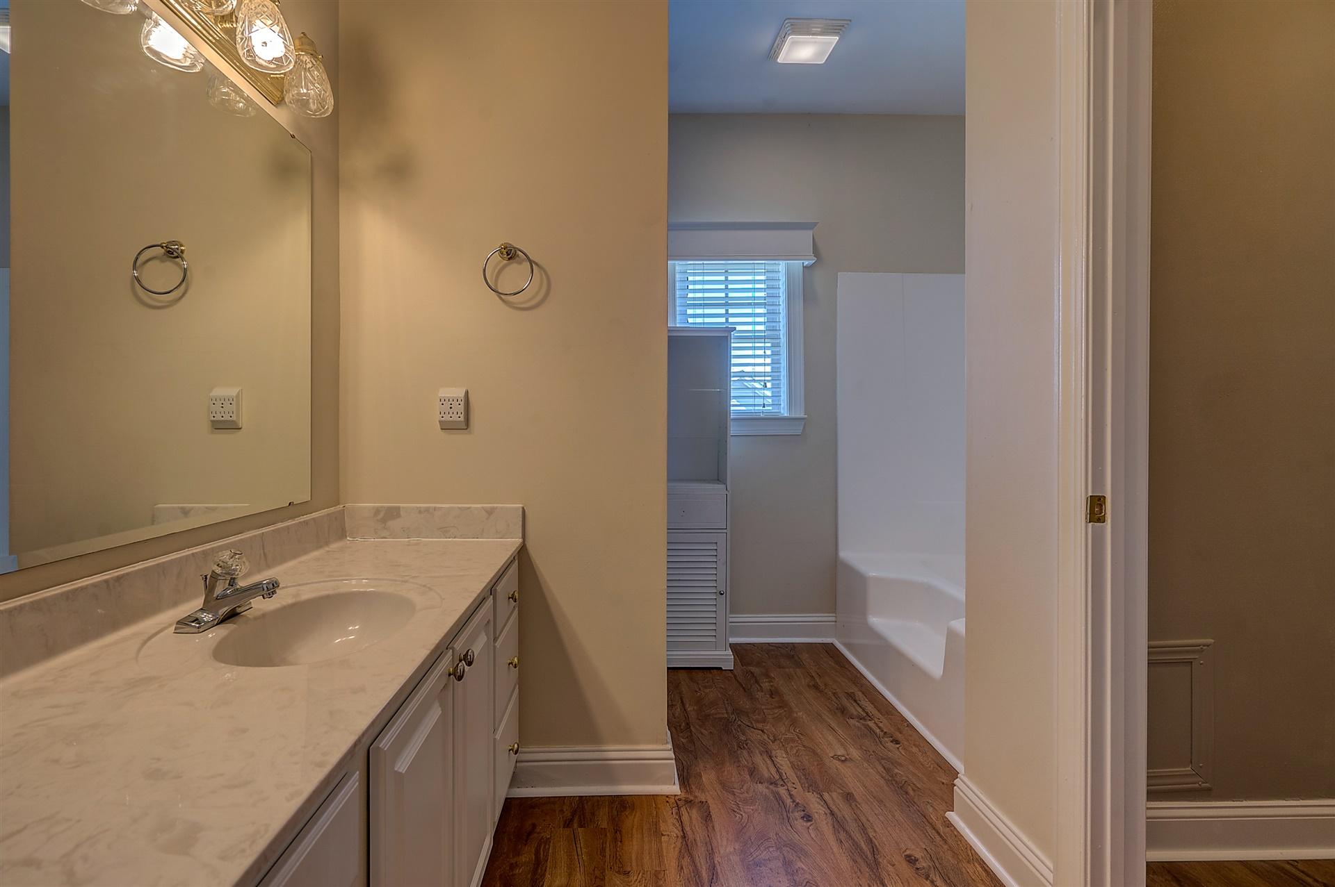 340 Mallard Point Road Wirtz, VA 24184 - Photo 26 of 41 a bathroom with a sink and a mirror