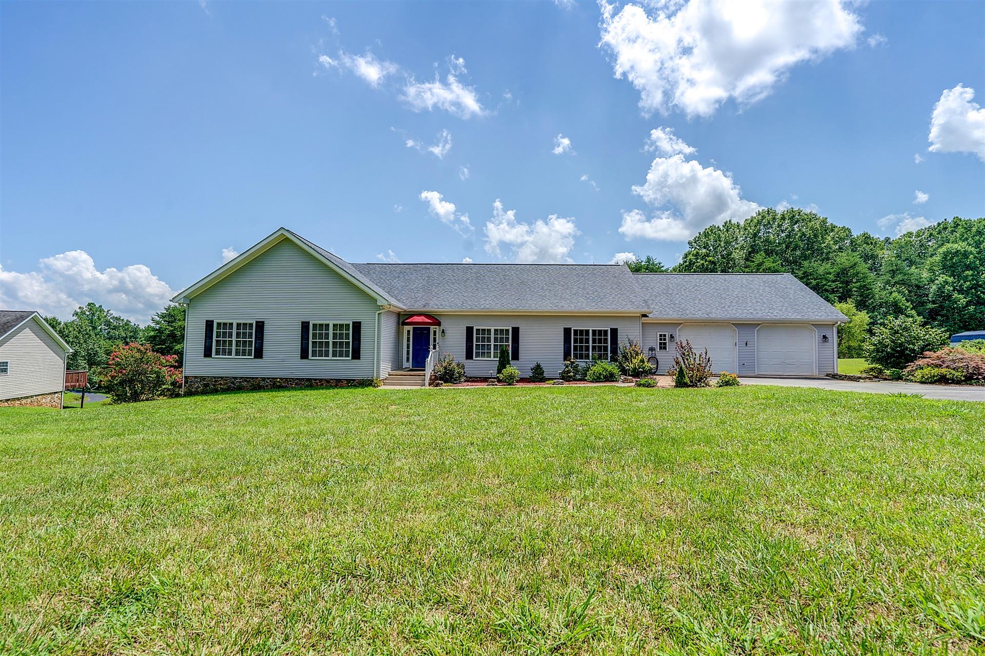 340 Mallard Point Road Wirtz, VA 24184 - Photo 4 of 41 a front view of house with yard and green space