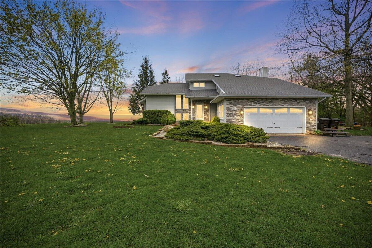 a view of a house with a big yard