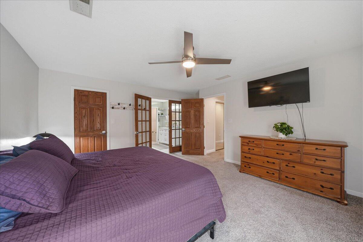 426 Laurel Lane Valparaiso, IN 46385 - Photo 24 of 48 a bed room with a bed a flat screen tv and a window
