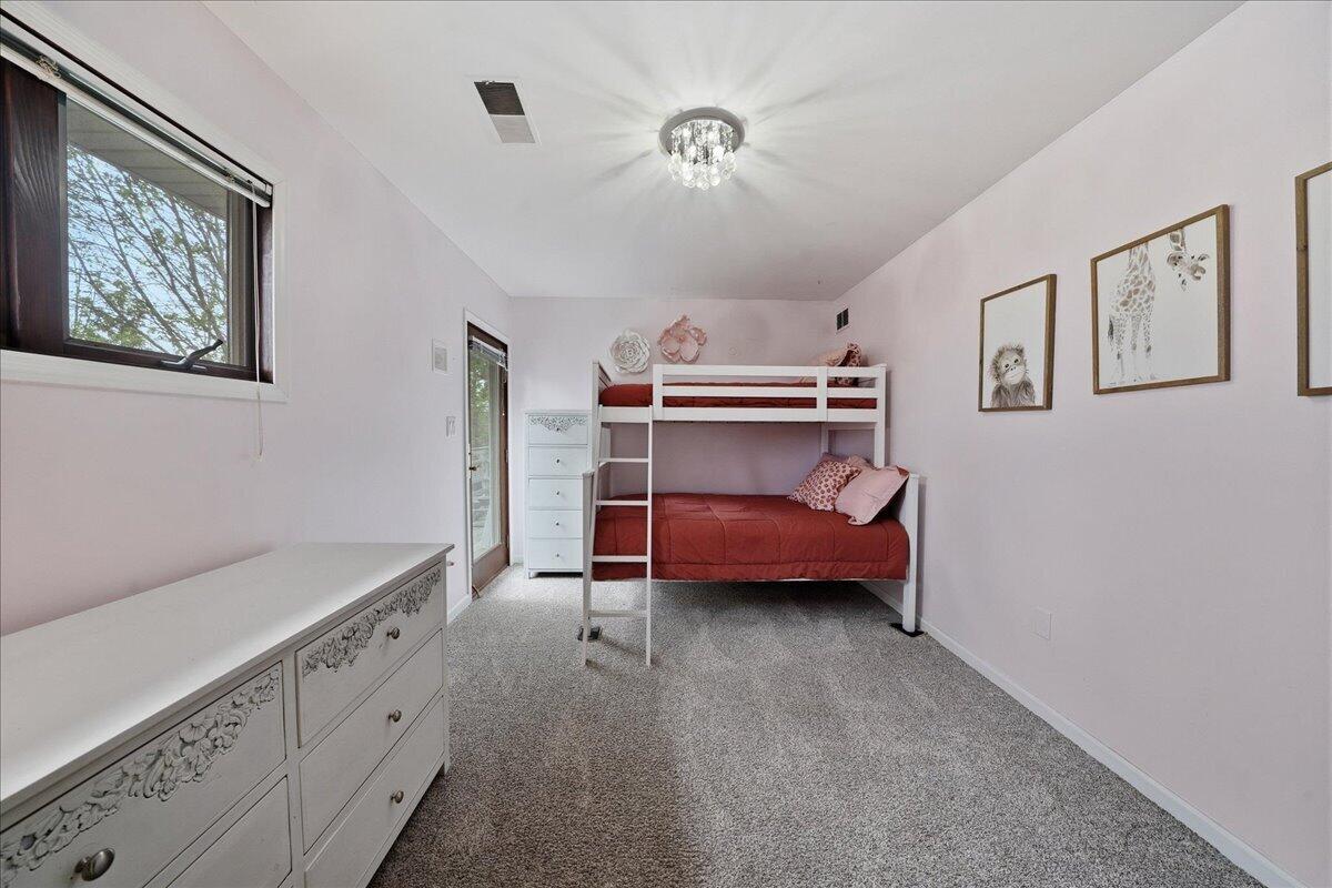426 Laurel Lane Valparaiso, IN 46385 - Photo 28 of 48 a bedroom with bed and window