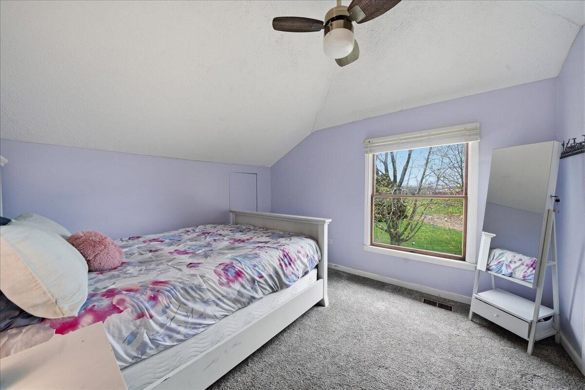 426 Laurel Lane Valparaiso, IN 46385 - Photo 30 of 48 a bedroom with a bed and a window