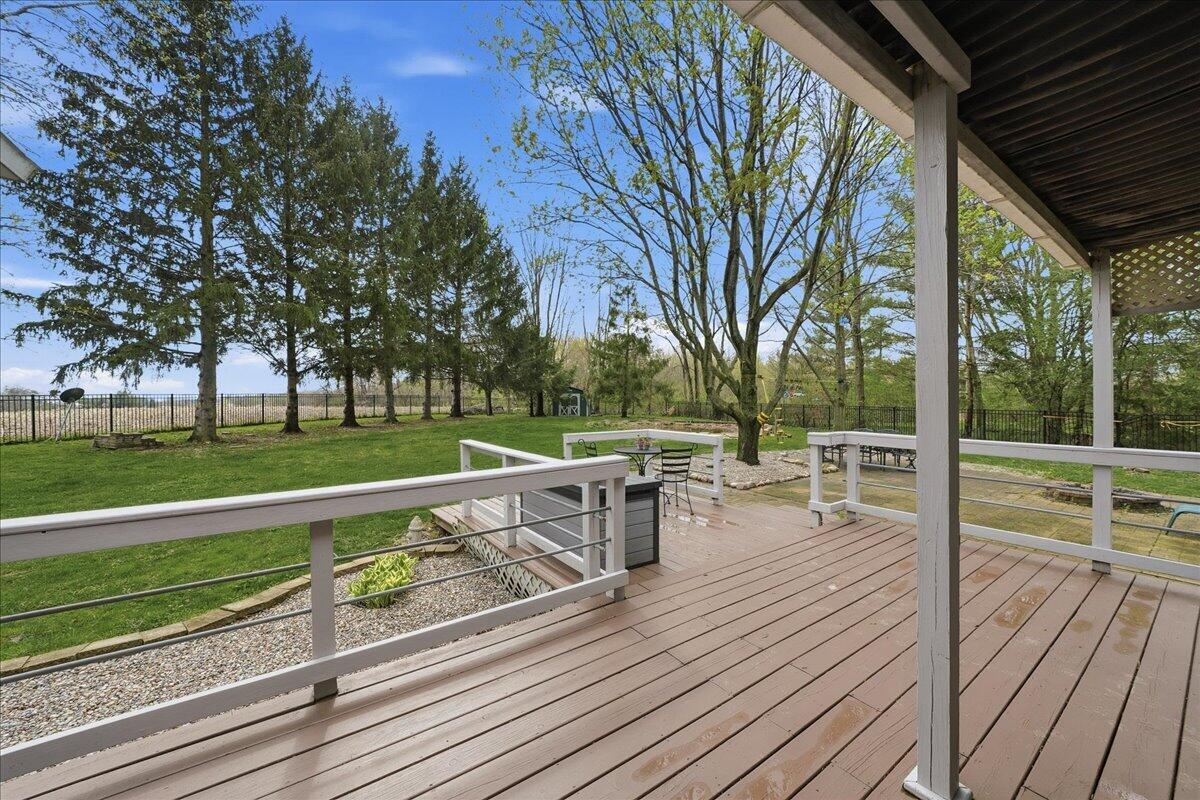 426 Laurel Lane Valparaiso, IN 46385 - Photo 34 of 48 a view of a deck with chairs and a large tree