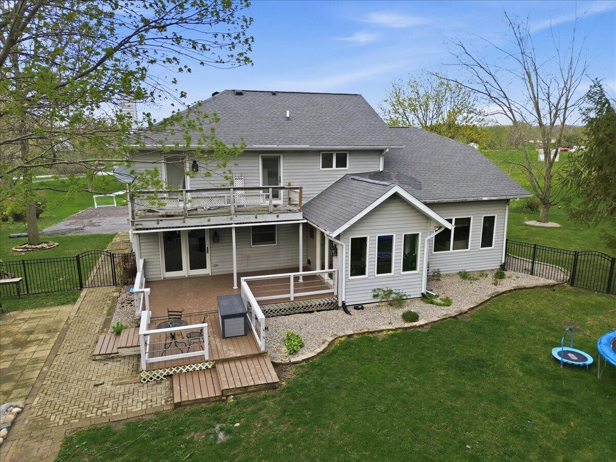 426 Laurel Lane Valparaiso, IN 46385 - Photo 35 of 48 a front view of a house with a yard table and chairs