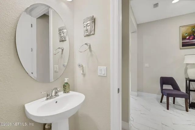 a kitchen with a table chairs and a stove