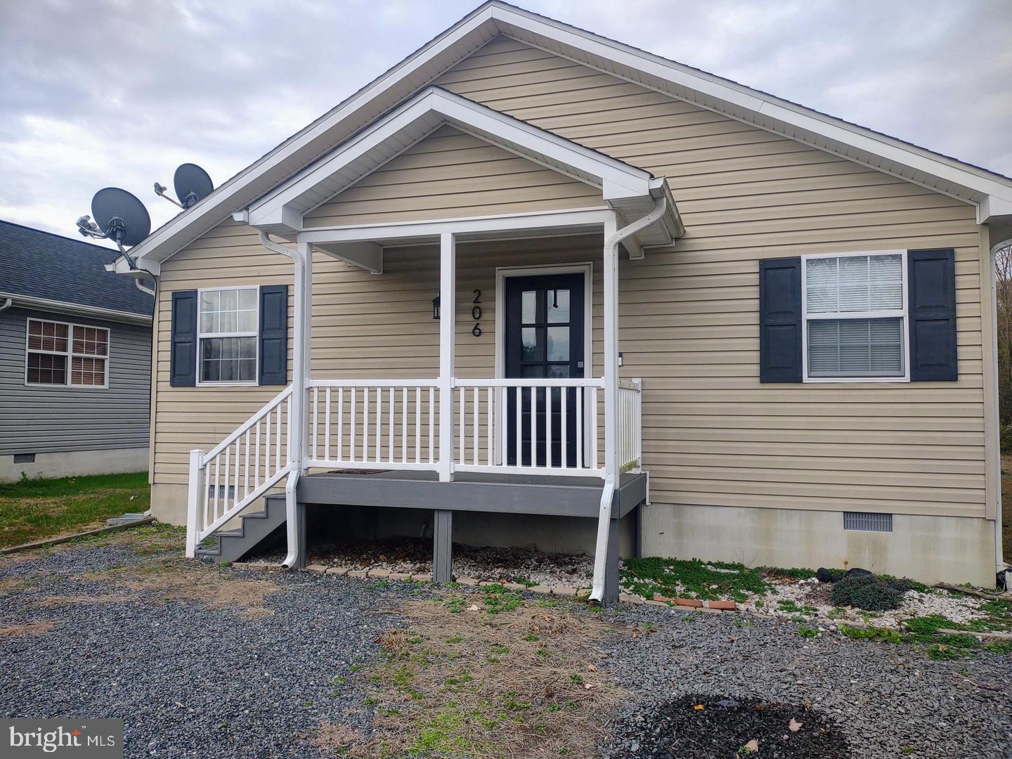 206 Decatur Street Berlin, MD 21811 - Photo 2 of 4 a view of a house with a yard