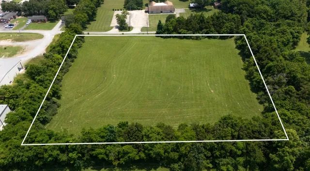 an aerial view of a tennis court
