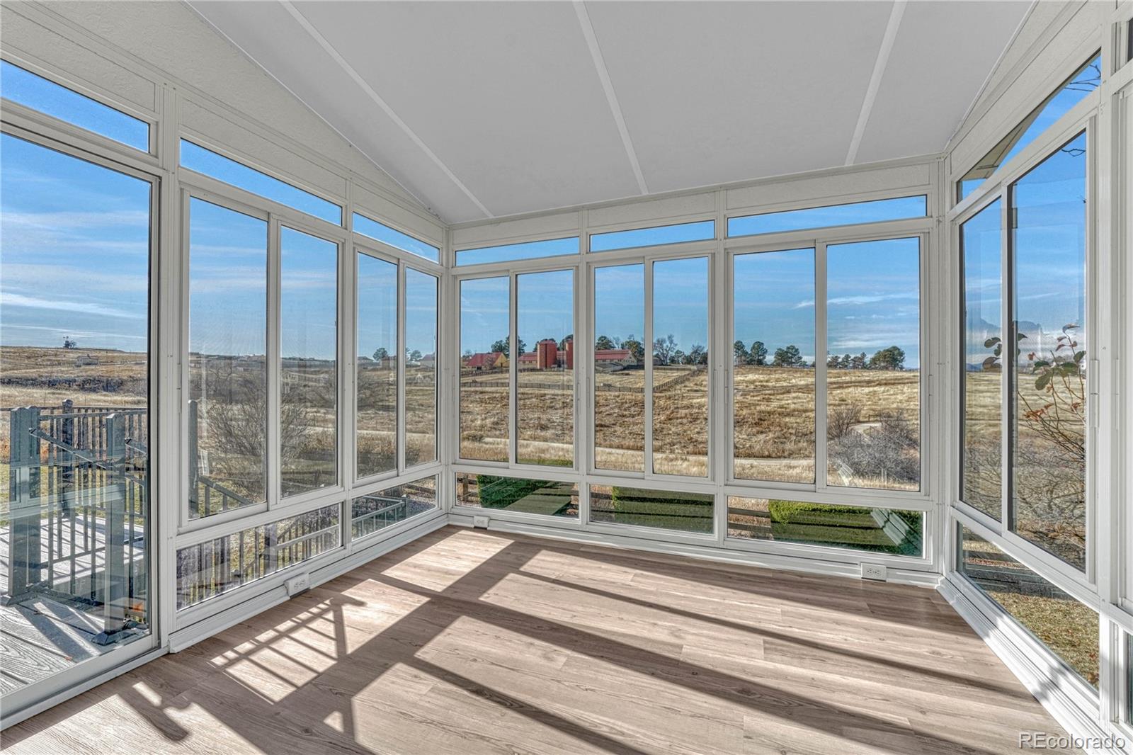 9858 Venneford Ranch Road Highlands Ranch, CO 80126 - Photo 22 of 50 a view of a balcony with a floor to ceiling window