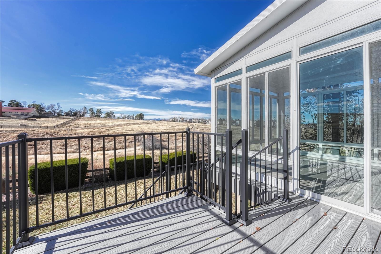 9858 Venneford Ranch Road Highlands Ranch, CO 80126 - Photo 23 of 50 a view of city from a balcony