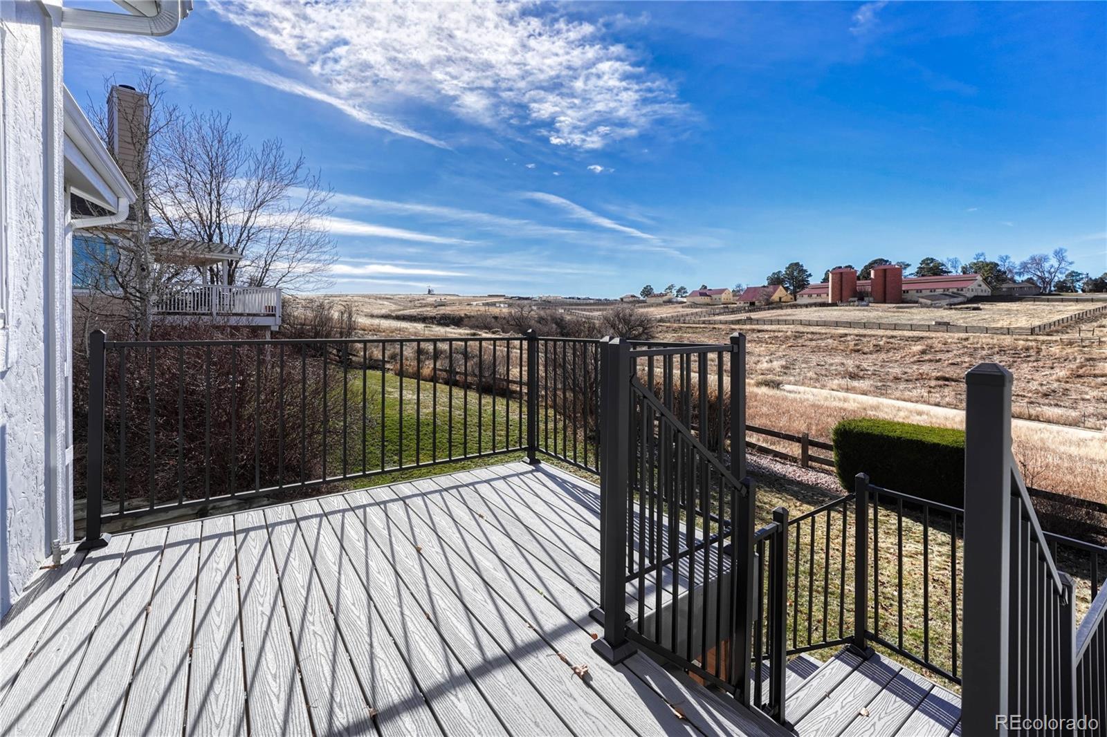 9858 Venneford Ranch Road Highlands Ranch, CO 80126 - Photo 24 of 50 a view of balcony with wooden floor