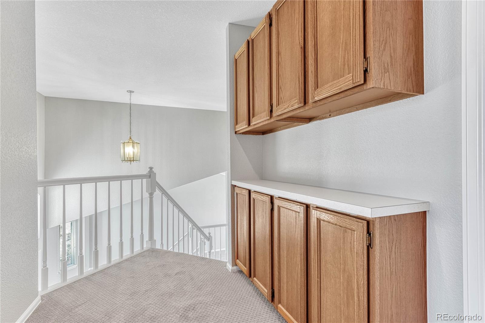 9858 Venneford Ranch Road Highlands Ranch, CO 80126 - Photo 28 of 50 a view of a hallway with entryway