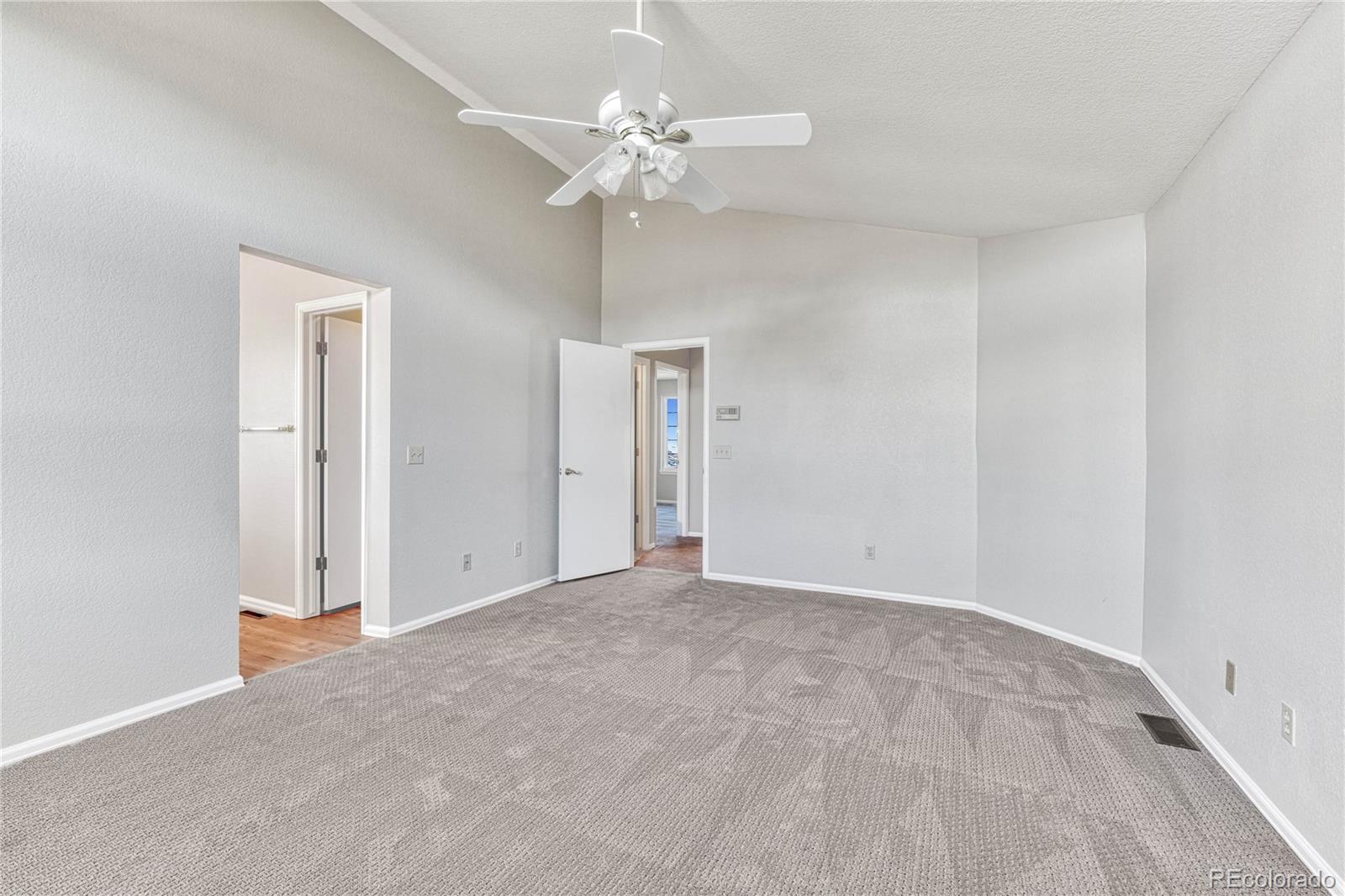 9858 Venneford Ranch Road Highlands Ranch, CO 80126 - Photo 31 of 50 a view of an empty room with a window