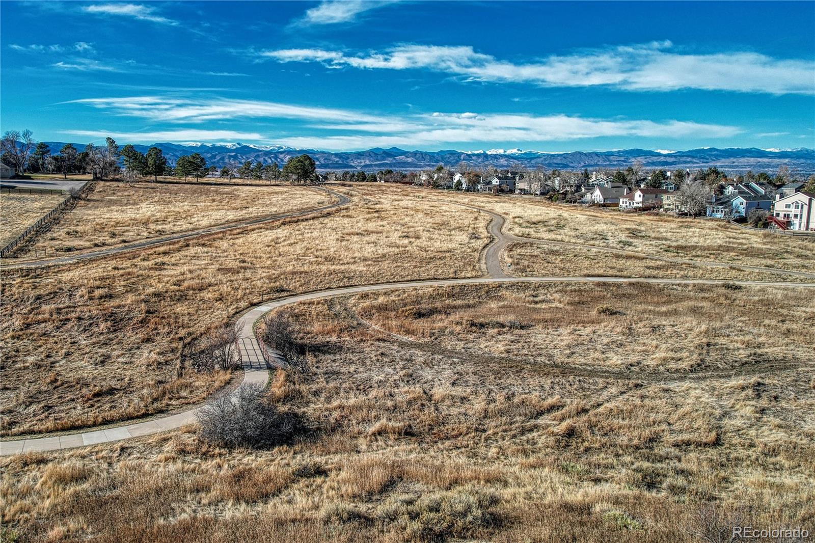 9858 Venneford Ranch Road Highlands Ranch, CO 80126 - Photo 49 of 50 a view of an ocean and beach