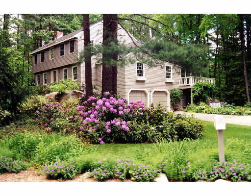 17 Willow Road Harvard, MA 01451 - Photo 1 of 1 a front view of a house with a yard