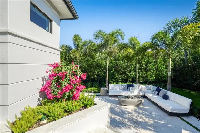 a backyard of a house with seating space