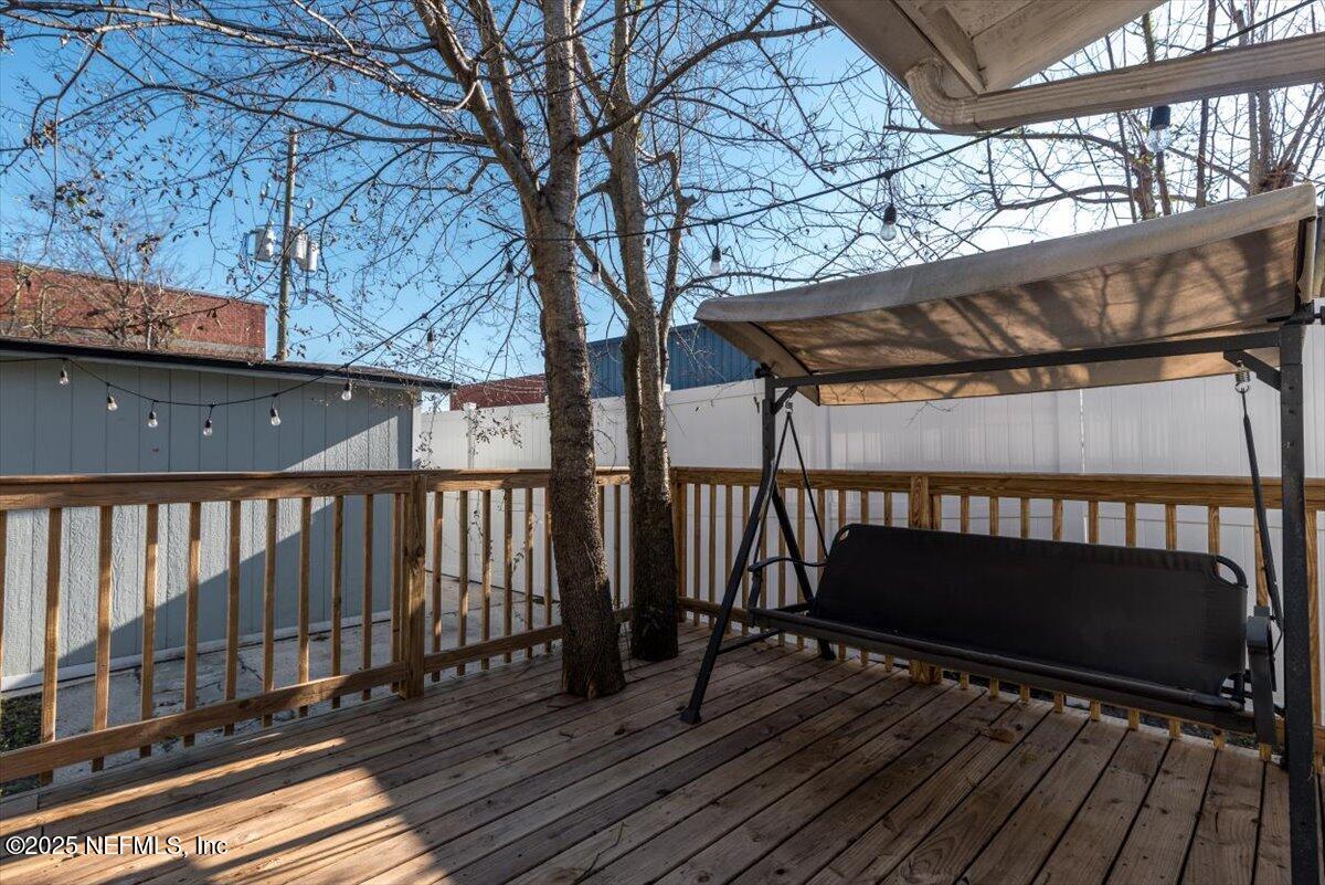 933 Talbot Avenue Jacksonville, FL 32205 - Photo 32 of 41 a view of balcony with wooden floor and fence
