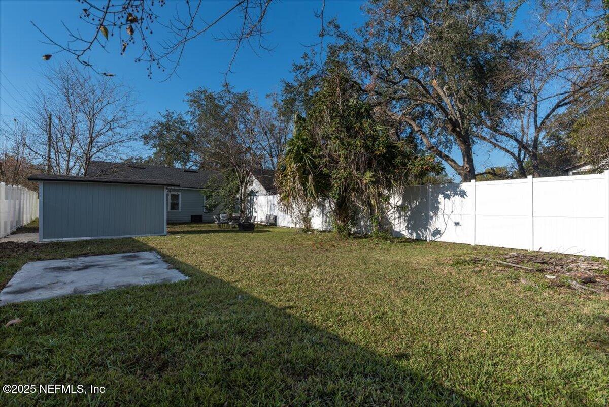 933 Talbot Avenue Jacksonville, FL 32205 - Photo 40 of 41 a view of backyard of house with trees