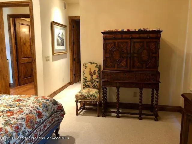 a view of an chairs and table in the balcony