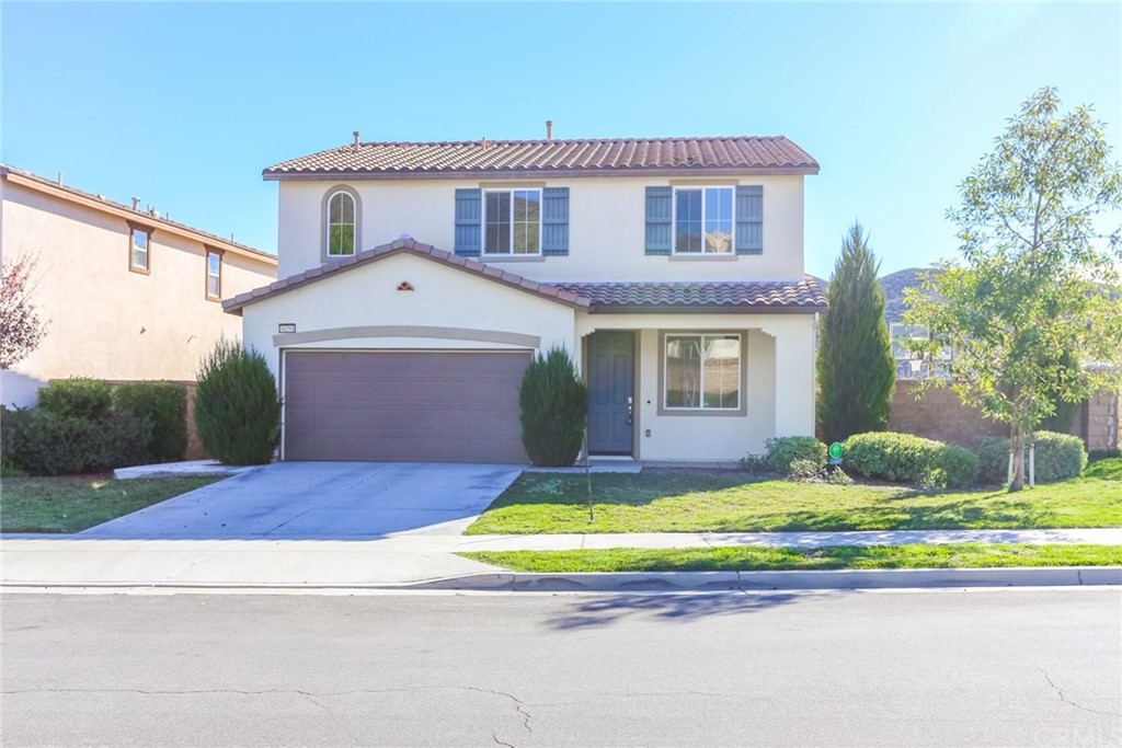 34291 Heather Ridge Road Lake Elsinore, CA 92532 - Photo 1 of 1 a view of house with outdoor space and view of a house