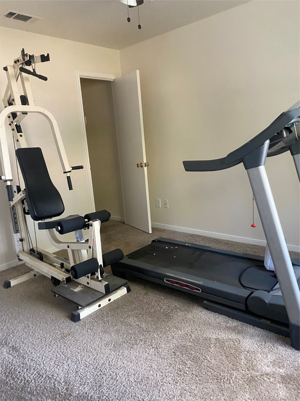 16302 Embry Hills Drive Houston, TX 77073 - Photo 12 of 16 a room with gym equipment