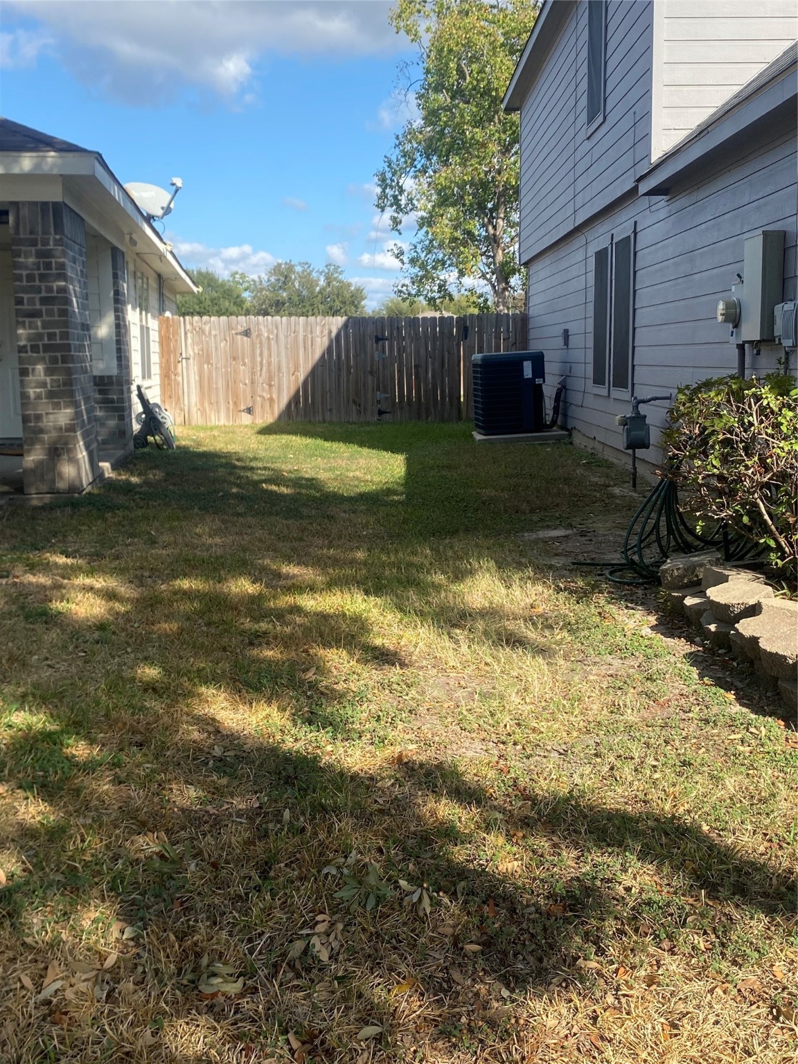 16302 Embry Hills Drive Houston, TX 77073 - Photo 6 of 16 a view of a house with a yard