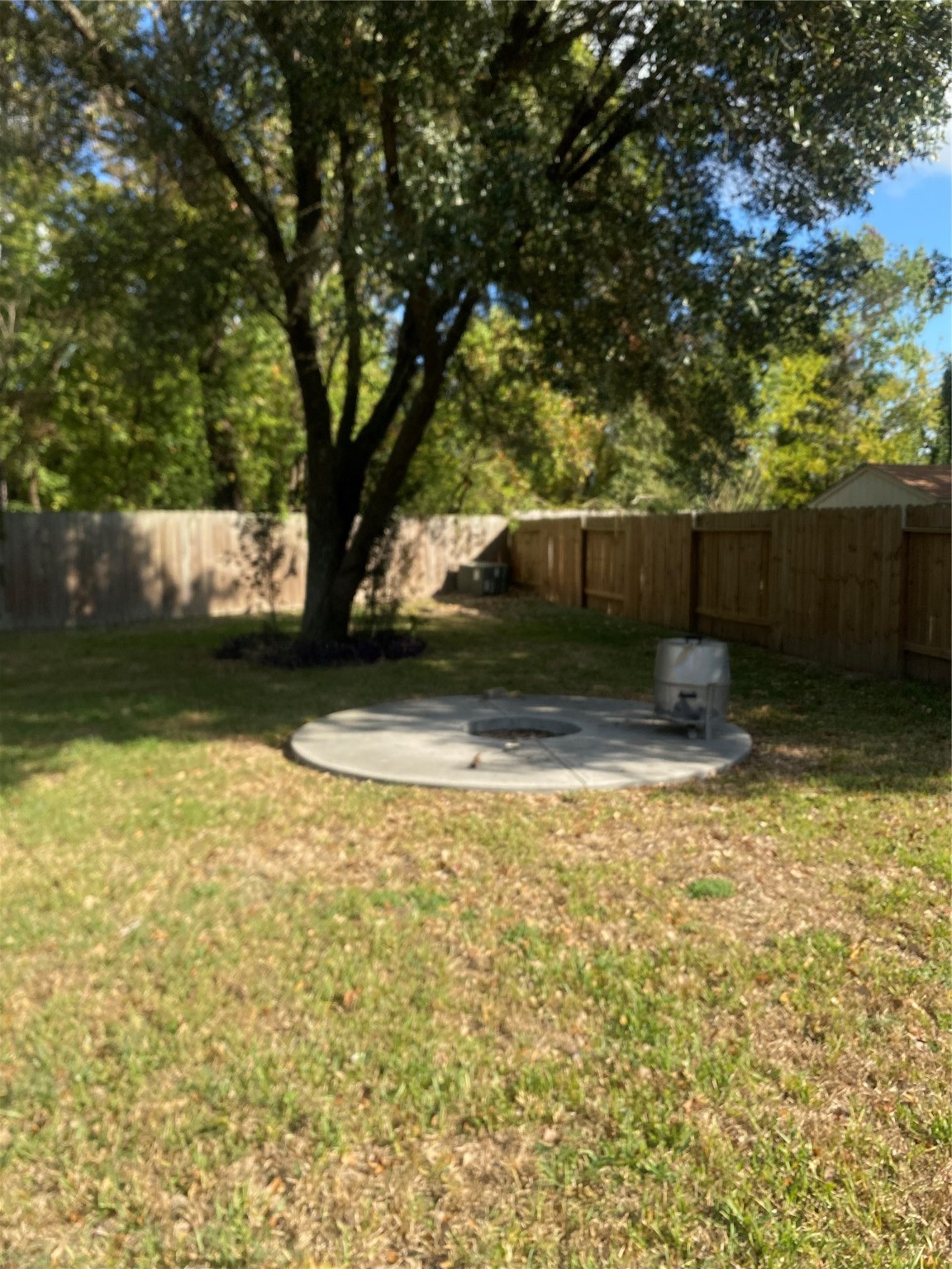 16302 Embry Hills Drive Houston, TX 77073 - Photo 8 of 16 a view of a backyard