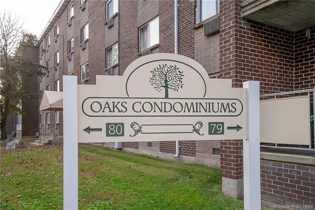 79 Claudia Drive, Unit 445 West Haven, CT 06516 - Photo 1 of 1 a view of a street sign