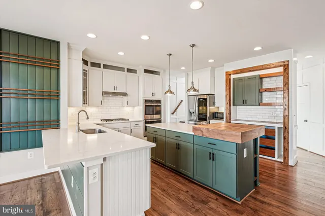 a bathroom with a sink double vanity and a shower