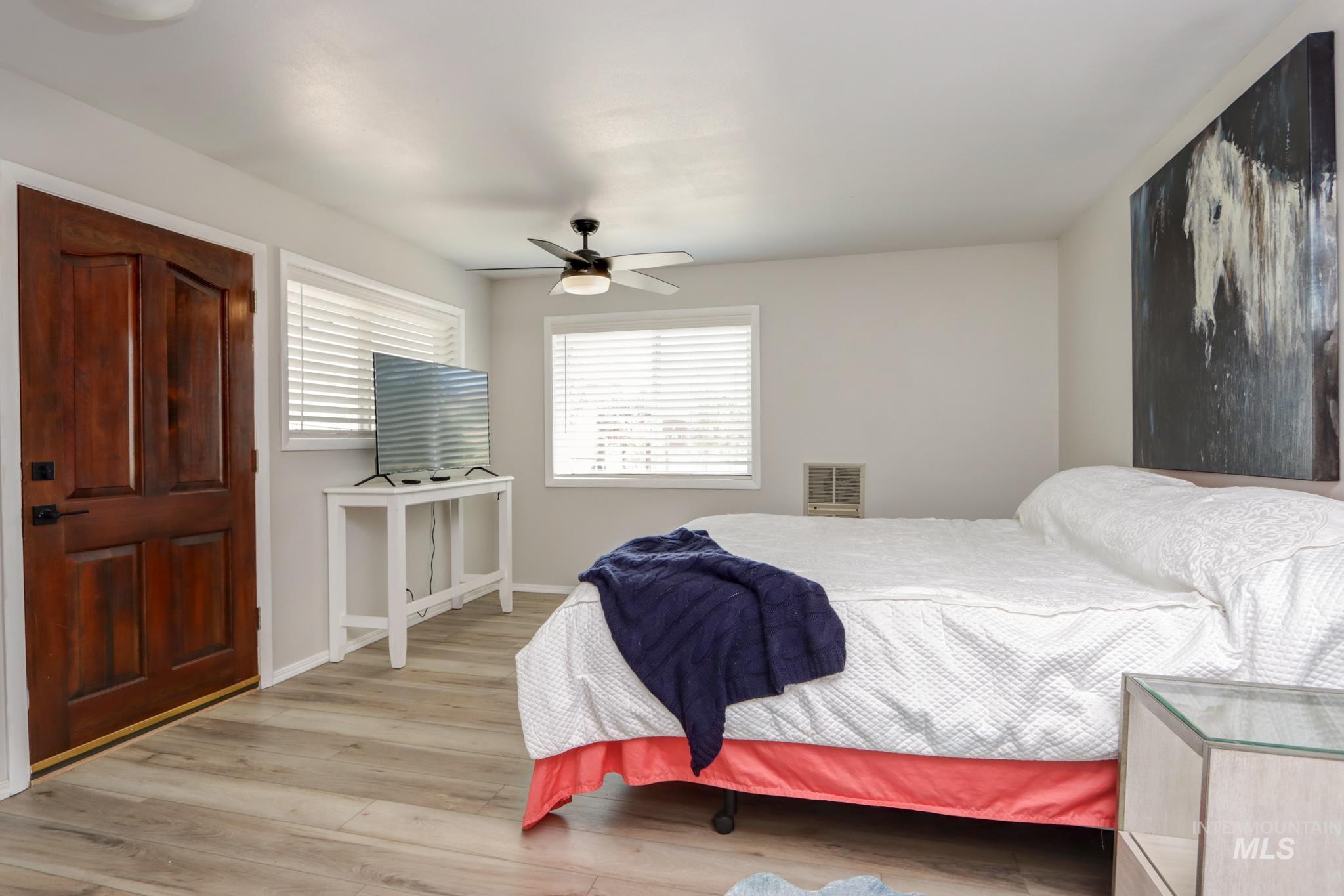 2528 Waterwheel Road Emmett, ID 83617 - Photo 33 of 50 Interior space featuring wood paneling walls and wood-finish flooring