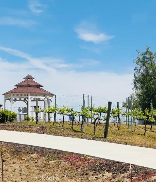 40995 Vía Fernando Temecula, CA 92592 - Photo 35 of 52 a front view of a building with trees