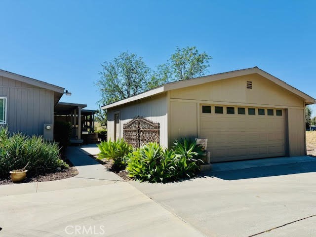 40995 Vía Fernando Temecula, CA 92592 - Photo 40 of 52 a front view of a house with garden