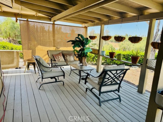 40995 Vía Fernando Temecula, CA 92592 - Photo 41 of 52 a building outdoor space with wooden benches and seating