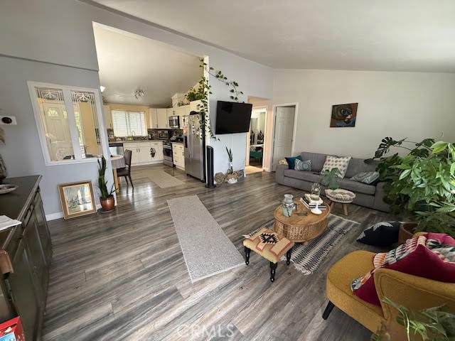 40995 Vía Fernando Temecula, CA 92592 - Photo 43 of 52 a living room with furniture wooden floor and flat screen tv