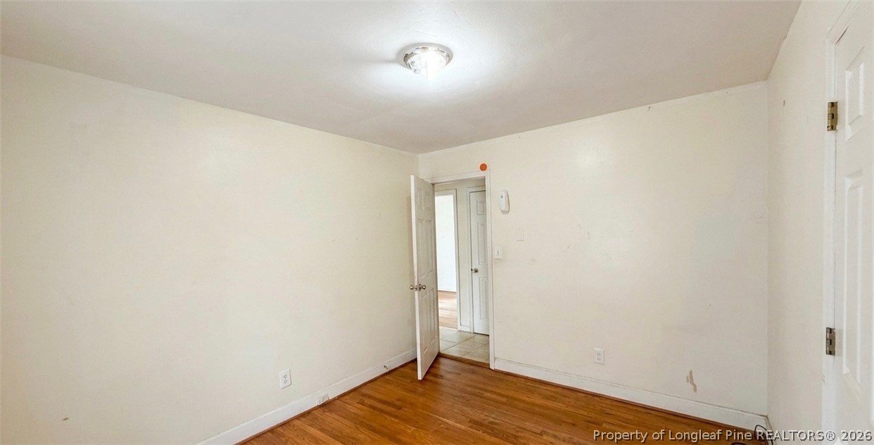 107 East Thigpen Road Conetoe, NC 27819 - Photo 10 of 13 a view of empty room with wooden floor
