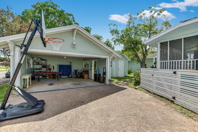 a view of a room with air conditioner duct and materials on floor