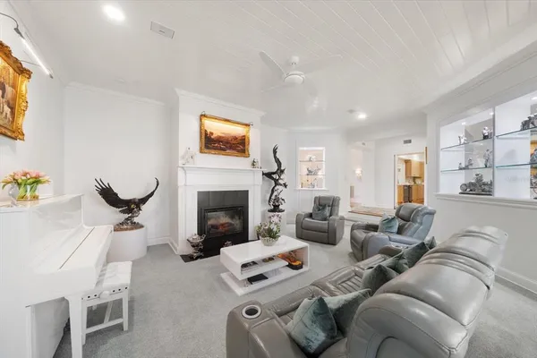 a bedroom with a large bed and a large window