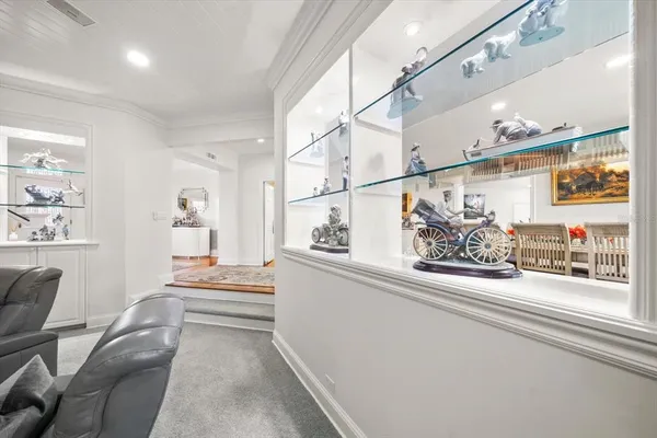 a bathroom with a bathtub sink and mirror