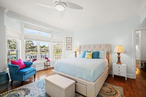 a kitchen with granite countertop white cabinets white stainless steel appliances with a sink and dishwasher
