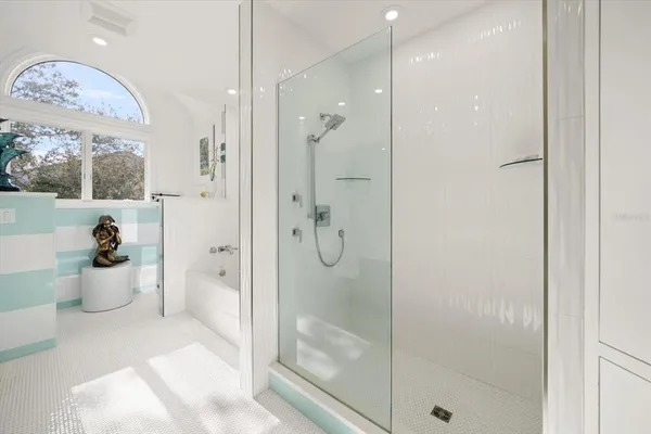 a view of house with yard and lake view