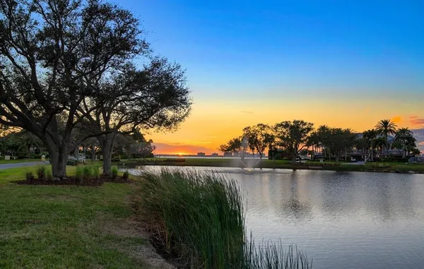 a kitchen with stainless steel appliances granite countertop a stove and a microwave