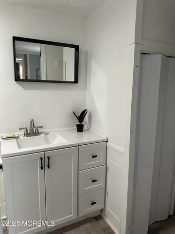 a utility room with cabinets