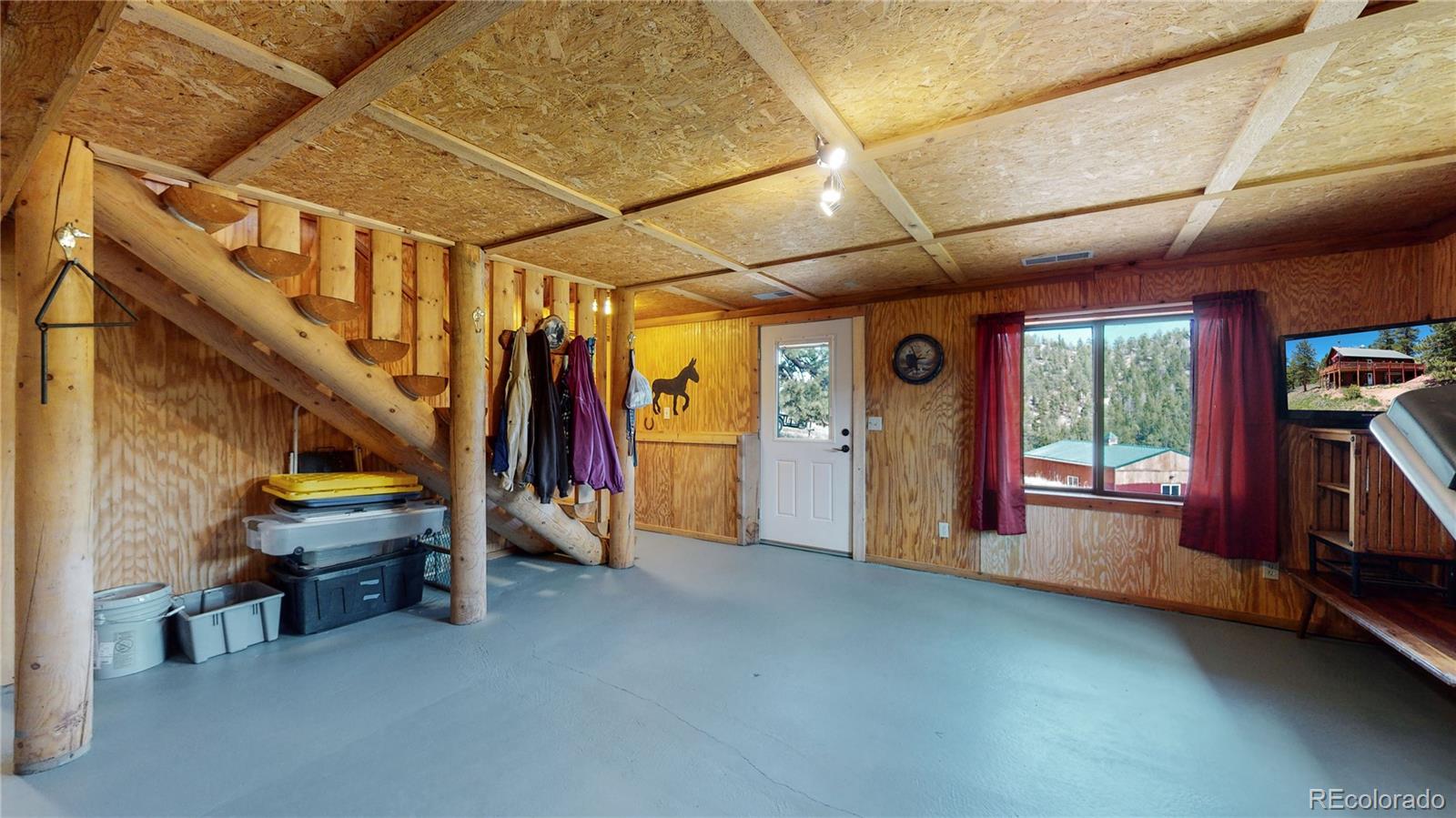688 Beartrap Road Red Feather Lakes, CO 80545 - Photo 24 of 40 a view of room with clothes and shoes
