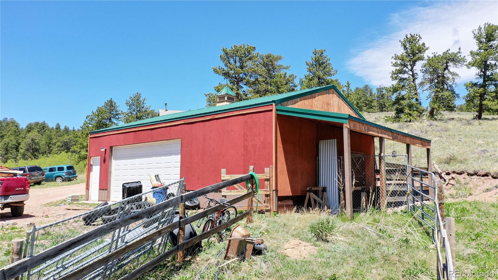 688 Beartrap Road Red Feather Lakes, CO 80545 - Photo 36 of 40 a front view of house with yard
