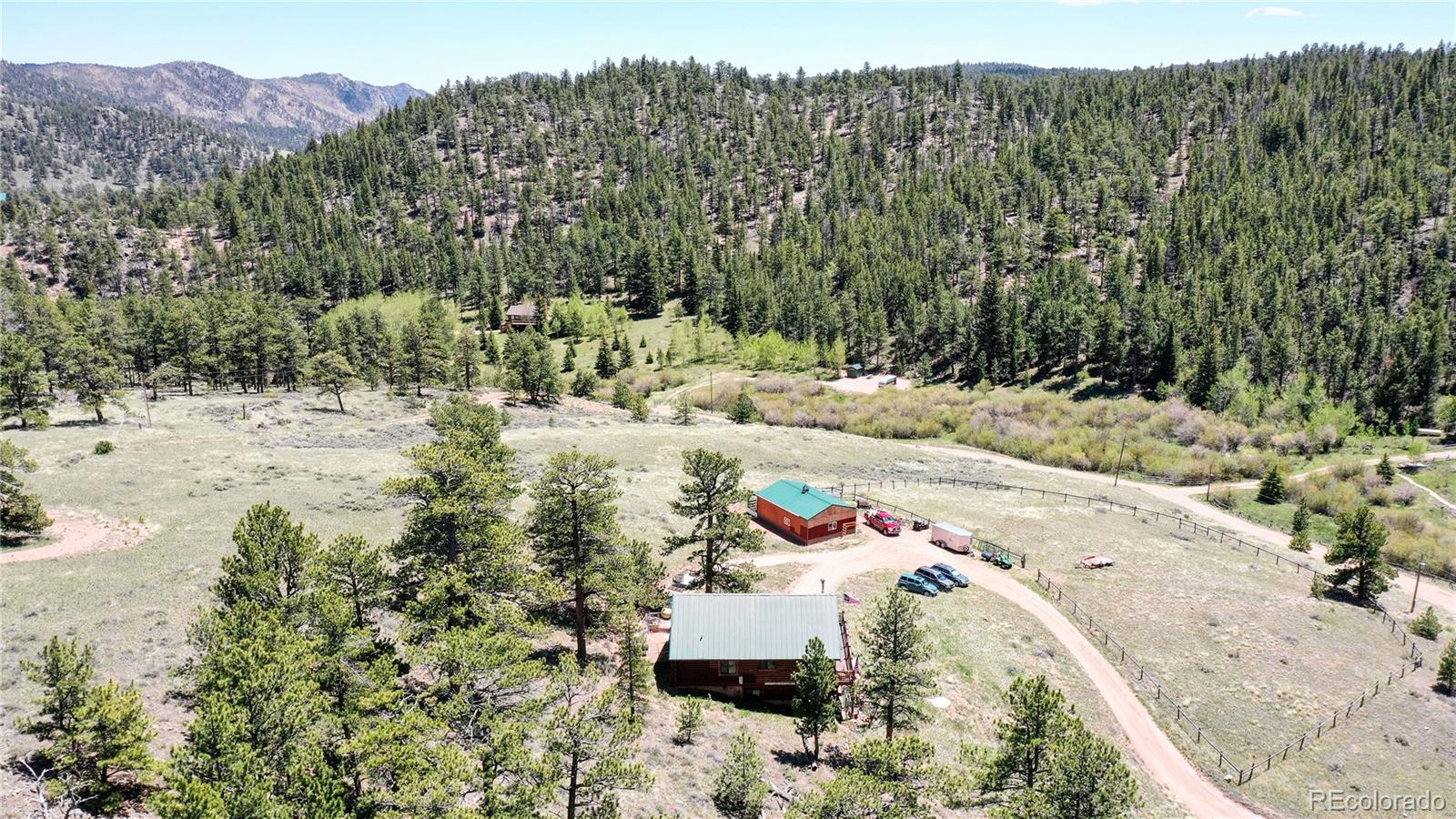 688 Beartrap Road Red Feather Lakes, CO 80545 - Photo 38 of 40 a view of a backyard of a house